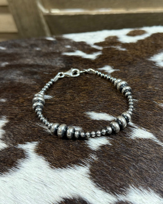 7.5" Graduated Saucer Pearl Bracelet